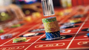 Live roulette table with professional dealer and multi-camera studio setup